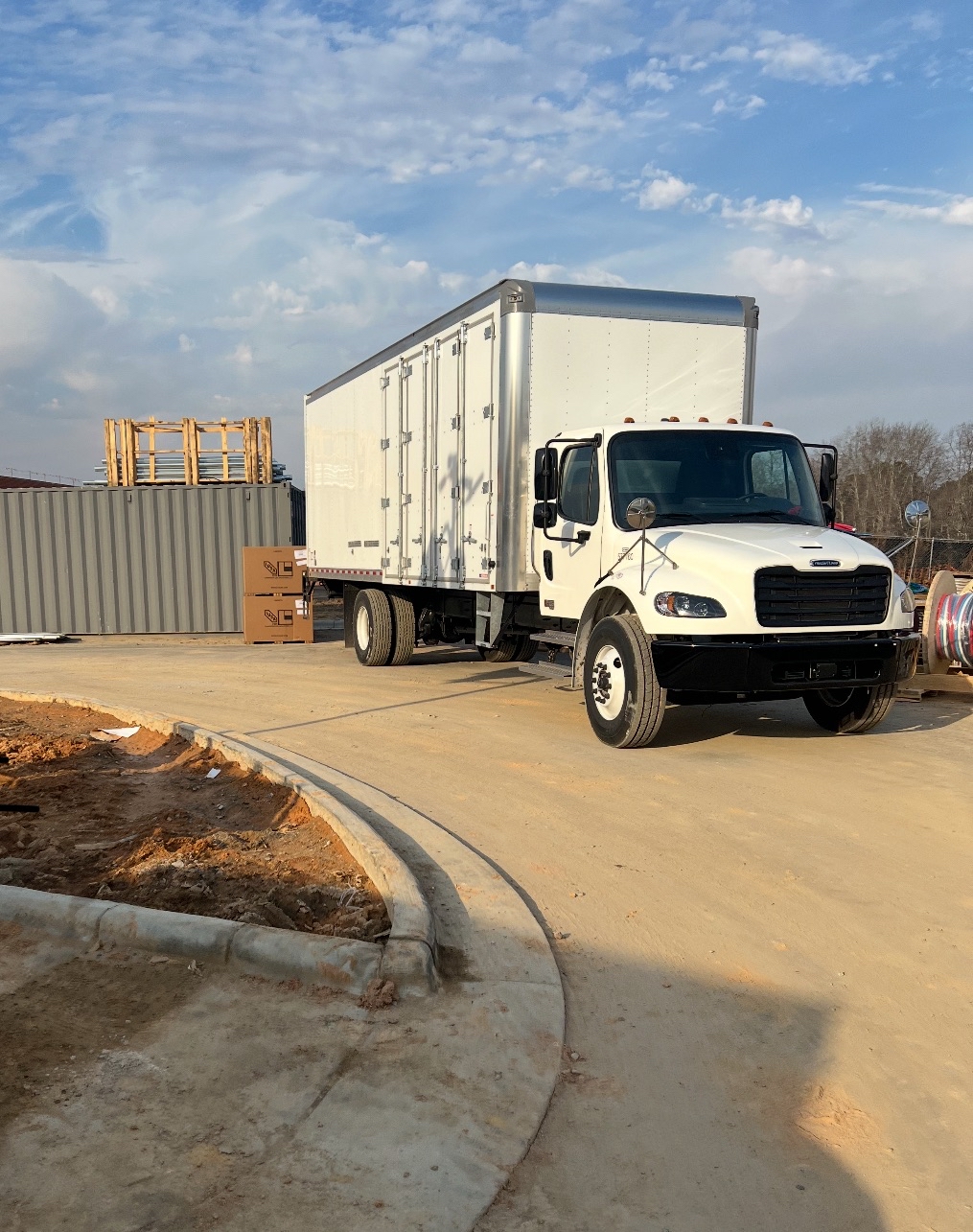AM&J delivery truck on a job site